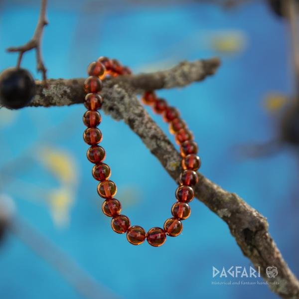 Bracelet made of perfect beads JANTAR - cognac colour clear