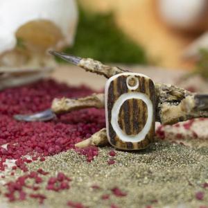 Pendant "O" carved into deer antler