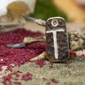 Pendant "T" carved into deer antler