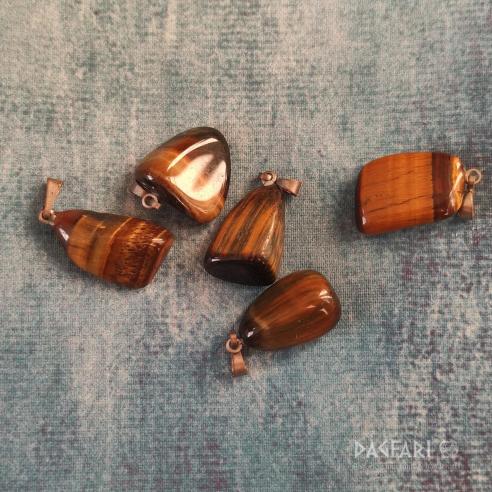 Polished semiprecious stone Tiger Eye for the cursed