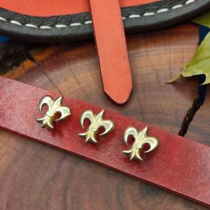 DECORATIVE BELT MOUNTS High medieval Brass decorative belt fittings Fleur-de-lis