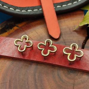 DECORATIVE BELT MOUNTS High medieval Brass decorative belt fittings Four-leaf clover