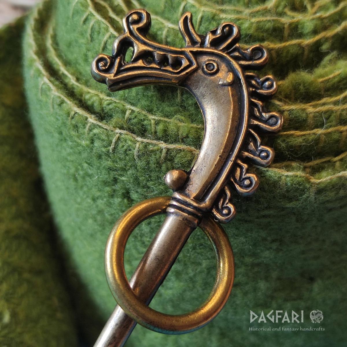 Bronze cloak pin with Dragon's head from Birka