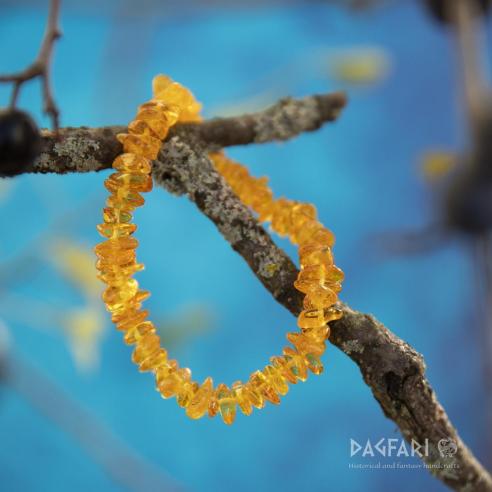 BERNSTEIN armband mit Sonnenschliff natur - getrommelte flache Steine - honigfarben